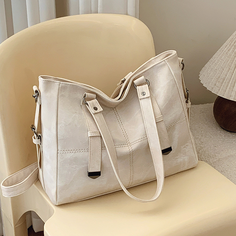 Crossbody torba Jiaen, PU materijal, gradski minimalistički stil, zatvaranje na zip, horizontalni kvadratni oblik