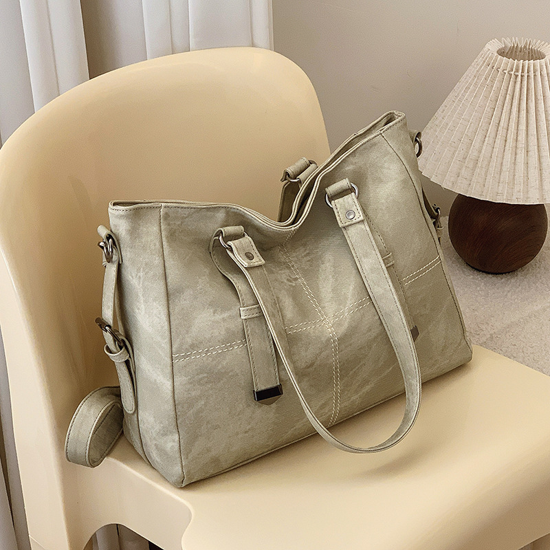Crossbody torba Jiaen, PU materijal, gradski minimalistički stil, zatvaranje na zip, horizontalni kvadratni oblik