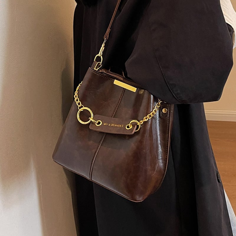 Torba tipa kofa od sintetičke kože, crossbody stil, zatvaranje zatvaračem, jedna naramenica (jesensko izdanje 2025)