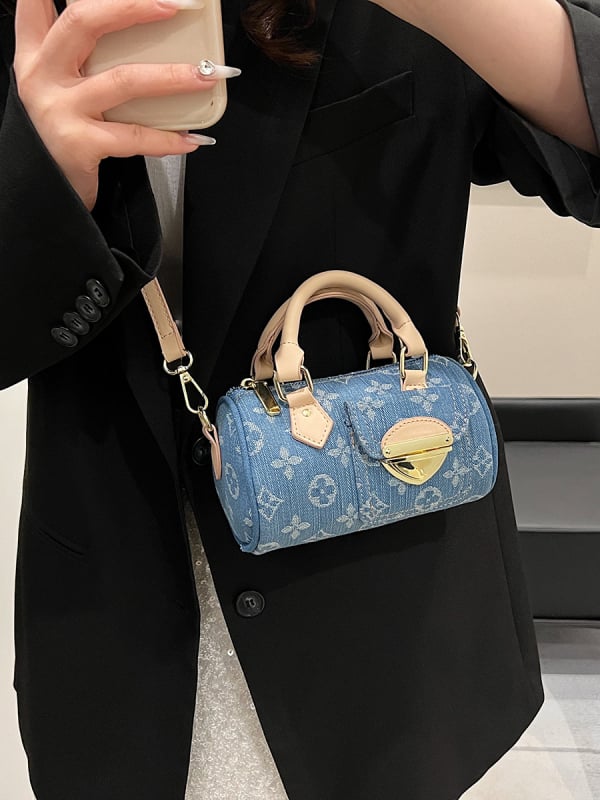 Denim cilindrična crossbody torba s poklopcem, zip zatvaračem i unutarnjim pretincom za telefon