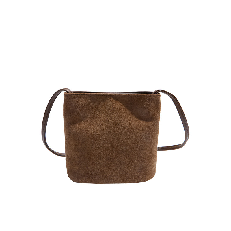 Ženska bucket torba od jelenje kože, ulični stil, horizontalni četvrtasti oblik, magnetsko zatvaranje, skrivena džep s zipom