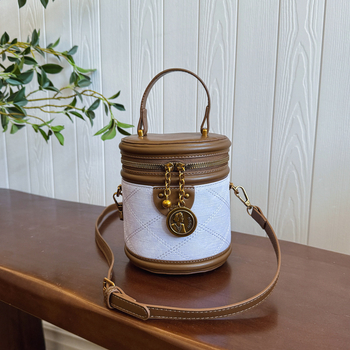 Jonica Ženska bucket torba: gradski minimalistički stil, PU materijal, cilindrični oblik, otvaranje preklopnim poklopcem