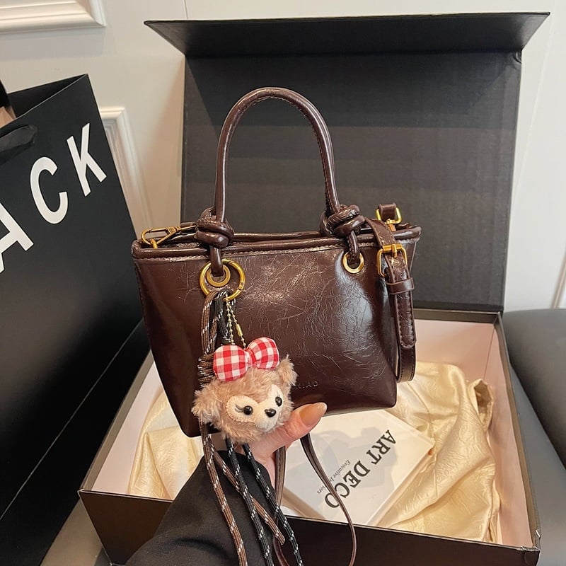 Geantă bucket cu stil urban simplu, material PU, formă bucket, închidere magnetică, buzunar interior cu fermoar, căptușeală din poliester, primăvara 2025