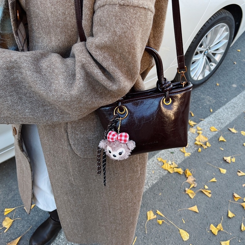 Geantă bucket cu stil urban simplu, material PU, formă bucket, închidere magnetică, buzunar interior cu fermoar, căptușeală din poliester, primăvara 2025