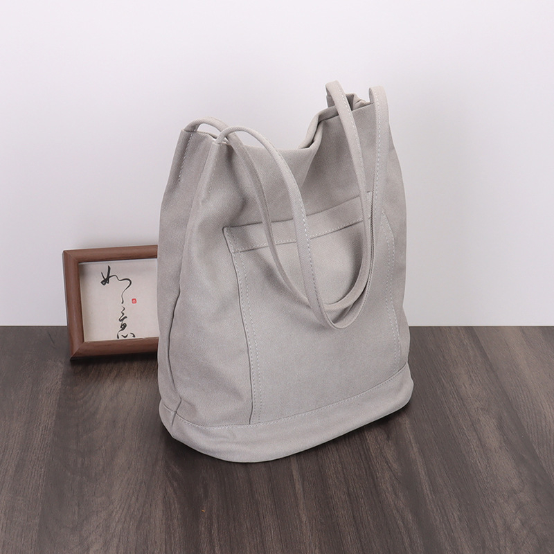 Bucket torba, urban stil, platno, vertikalni kvadratni oblik, magnetsko zatvaranje, skriveni džep sa zipom, džep za mobitel, džep za ID