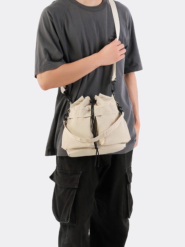 Geantă bucket din nylon cu închidere cu șnur, căptușeală poliester, buzunare interioare pentru telefon și documente, stil japonez-coreean