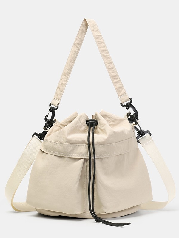 Geantă bucket din nylon cu închidere cu șnur, căptușeală poliester, buzunare interioare pentru telefon și documente, stil japonez-coreean