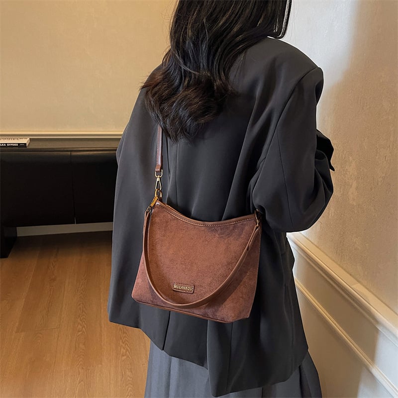 Geantă bucket pentru femei, imprimeu leopard, stil urban minimalist, material Super Fiber, formă bucket, închidere cu fermoar, căptușeală poliester, buzunar intern cu fermoar