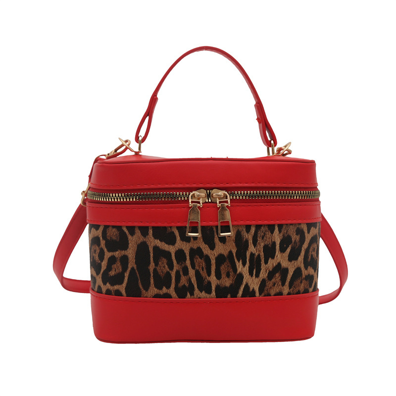 Crossbody bucket torbica s leopardim uzorkom u kontrastnoj boji, PU materijal, srednja veličina, poklopac s magnetskim zatvaračem, unutarnja pretinica za mobitel, urbano jednostavan stil, proljeće 2025