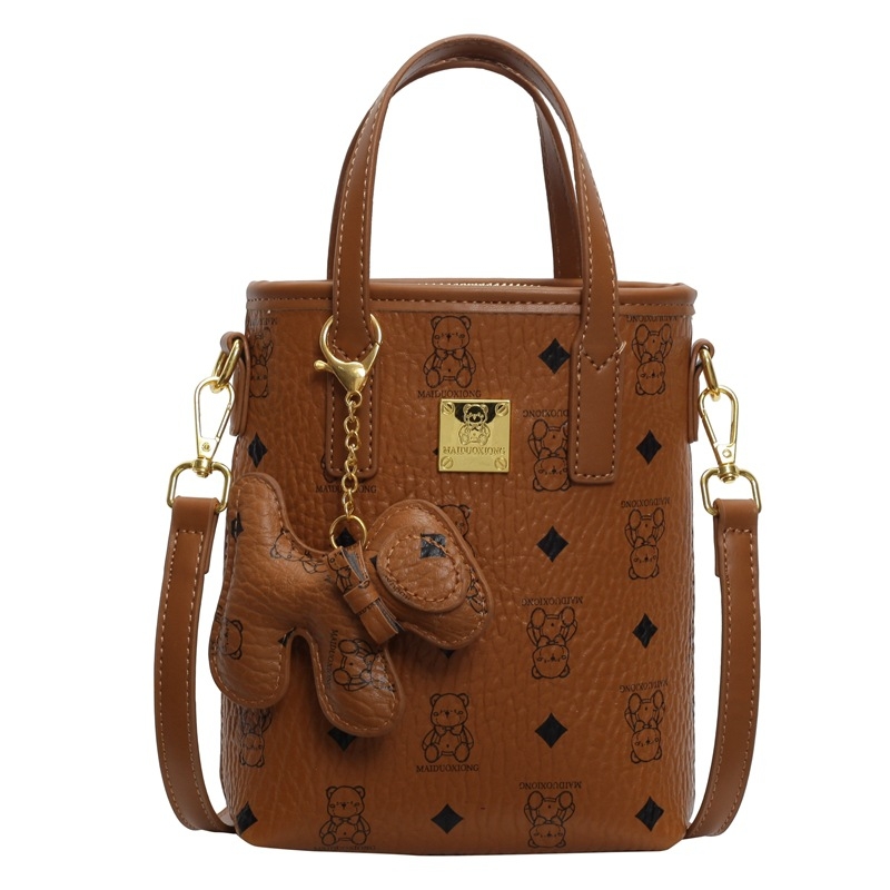 Ženska bucket torba od PU-a, 2025 novi model, kompaktnog vertikalnog kvadratnog oblika, crossbody torba s pretincem za telefon, gradski minimalistički stil.