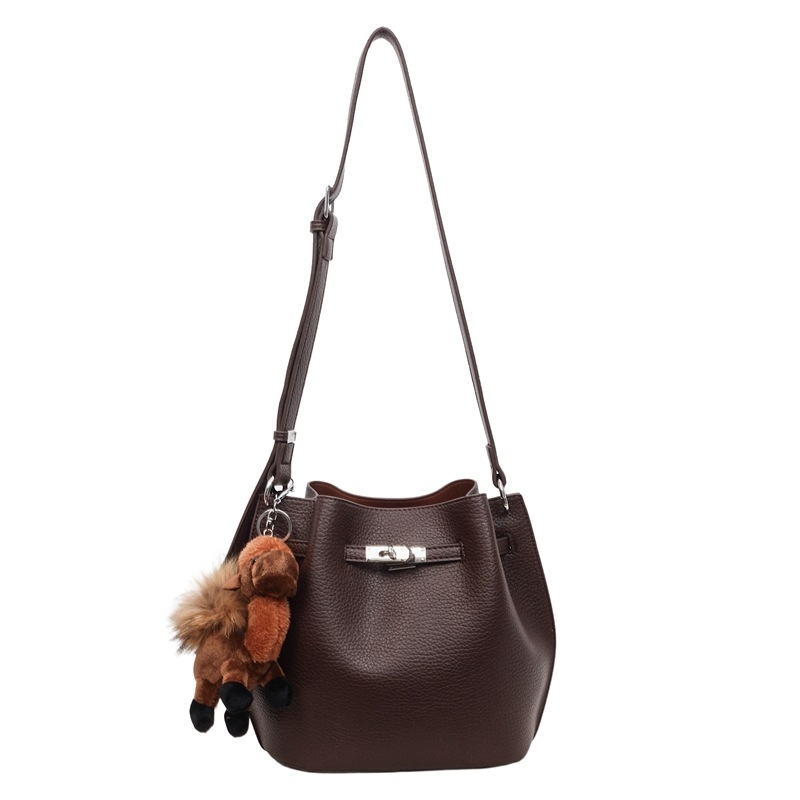 Ženska bucket torba, PU materijal, ramenski crossbody, poliester podstava, zaključavanje na ključ