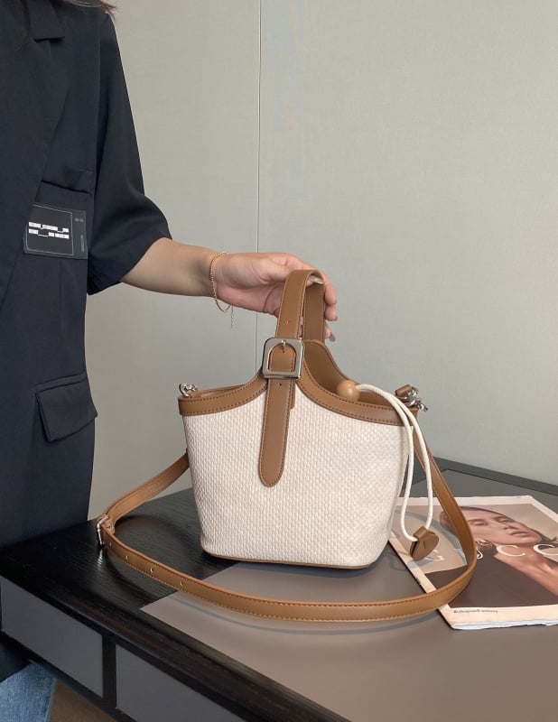 Torba tipa kanta s šnurnim otvaranjem, gradski minimalistički stil, visokokvalitetan materijal, jedna naramenica