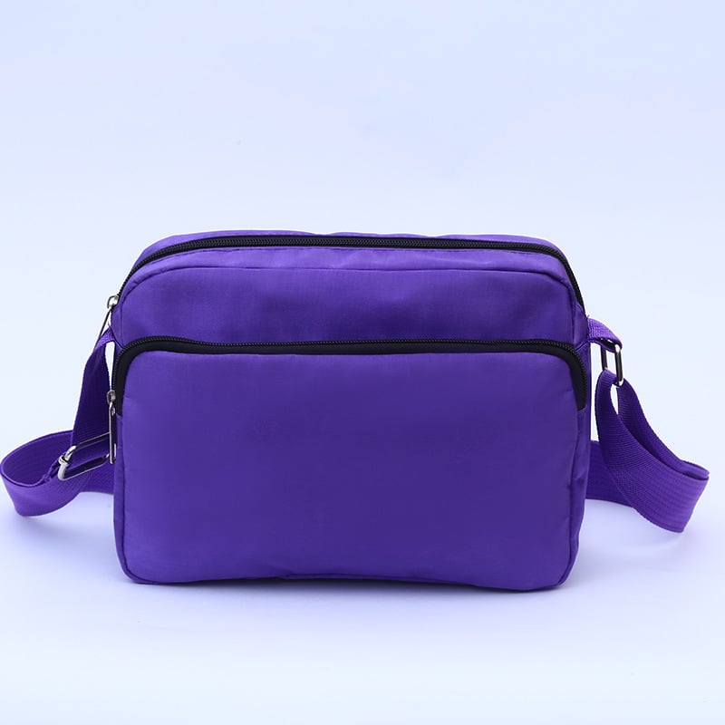 Crossbody torbica od Oxford platna, horizontalni kvadratni oblik, zatvaranje zatvaračem, trodimenzionalni vanjski dio