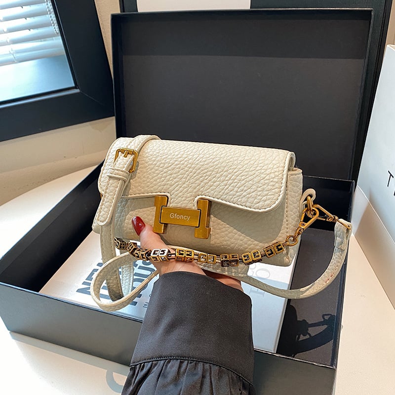 Crossbody torba od PU, horizontalni kvadratni oblik, zatvaranje preklopom, laminirani unutarnji džep sa zatvaračem, poliester podstava, proljeće 2025