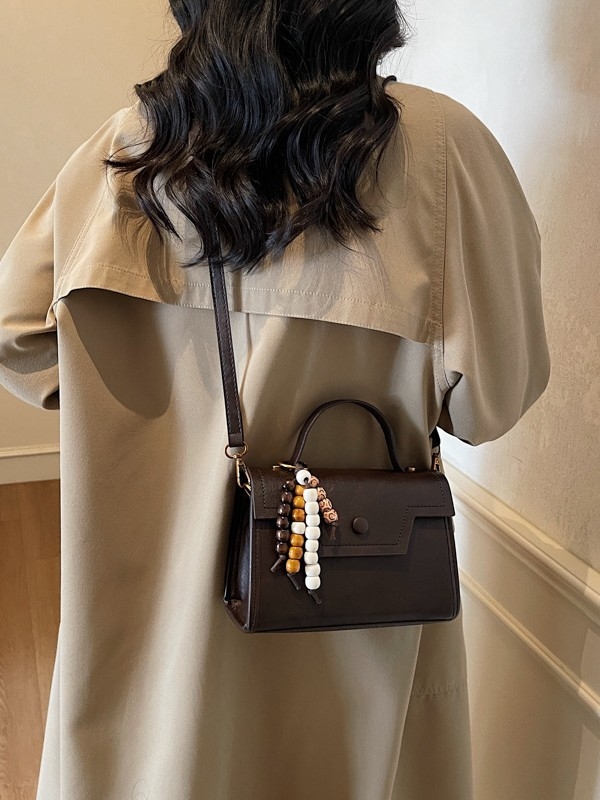 Crossbody torbica, PU materijal, horizontalni kvadratni oblik, otvorenje poklopac, unutarnja pretinica za dokumente
