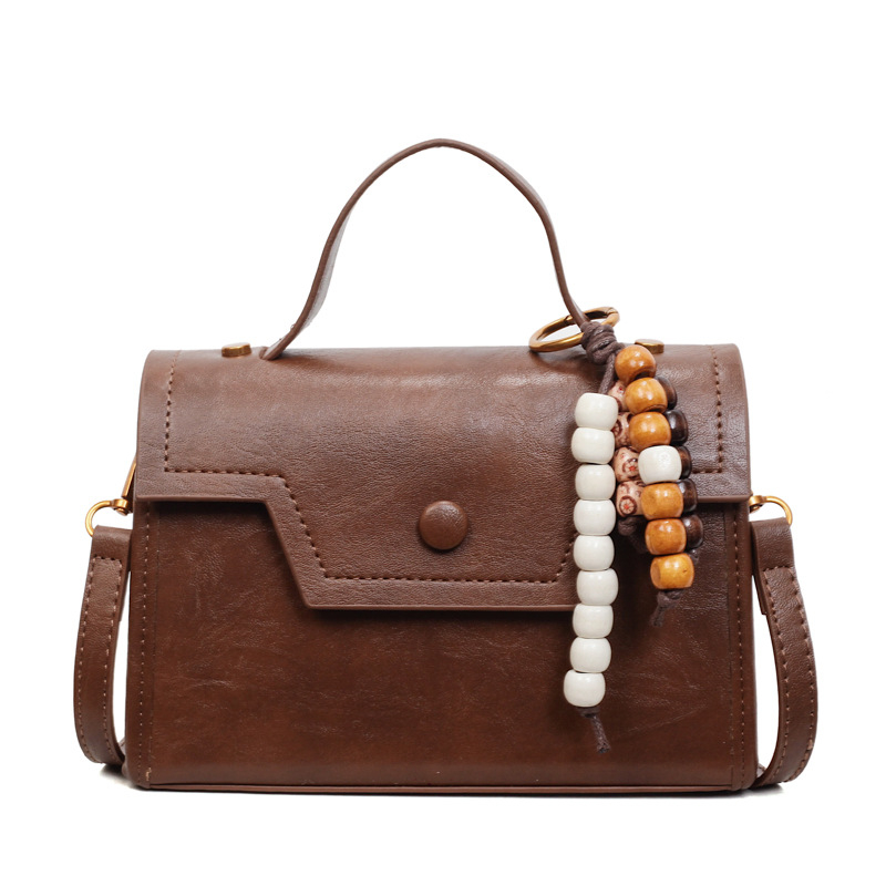 Crossbody torbica, PU materijal, horizontalni kvadratni oblik, otvorenje poklopac, unutarnja pretinica za dokumente