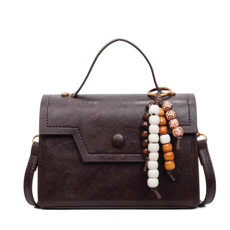 Crossbody torbica, PU materijal, horizontalni kvadratni oblik, otvorenje poklopac, unutarnja pretinica za dokumente