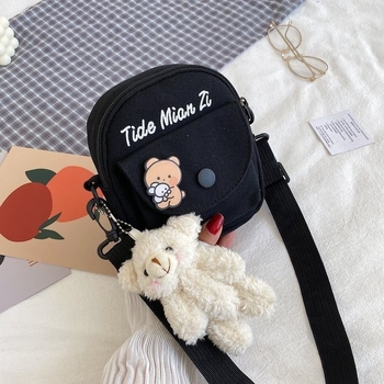 Kanvas torba za ramena u street stilu, mala kvadratna forma, vertikalni dizajn, zatvarač