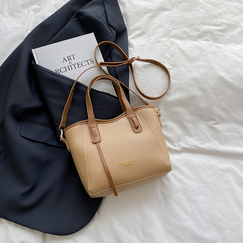 PU crossbody bucket taška, mestský minimalistický štýl, horizontálny štvorcový tvar, zipsové zapínanie, polyesterové vnútro