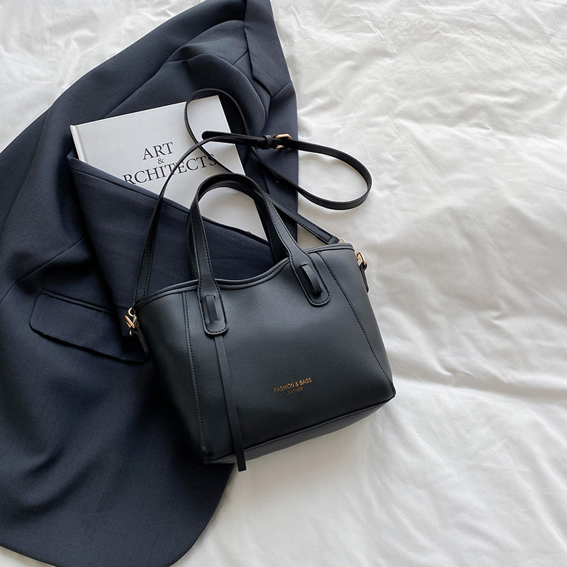 PU crossbody bucket taška, mestský minimalistický štýl, horizontálny štvorcový tvar, zipsové zapínanie, polyesterové vnútro