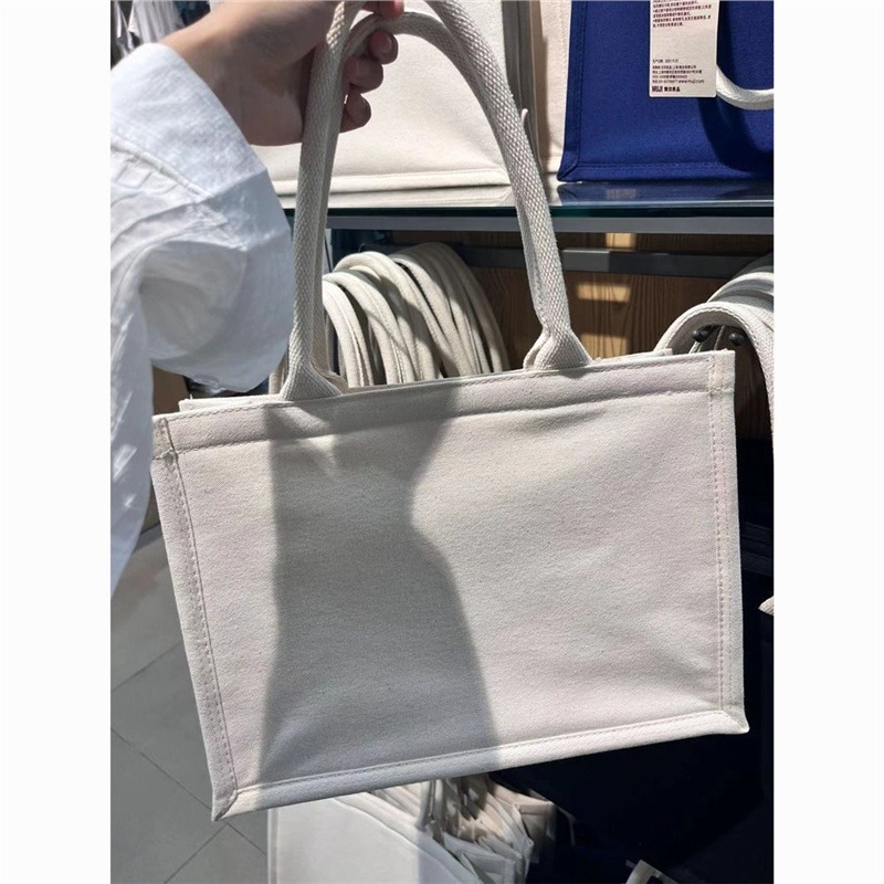 Platnena torba za laptop - Unisex, ručno i preko ramena, Jesen 2024