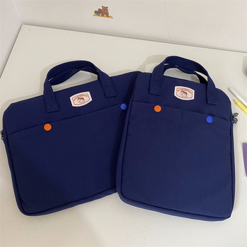 Geantă laptop unisex din Oxford, rezistentă la uzură și reduce povara purtării, lansată vara 2023.