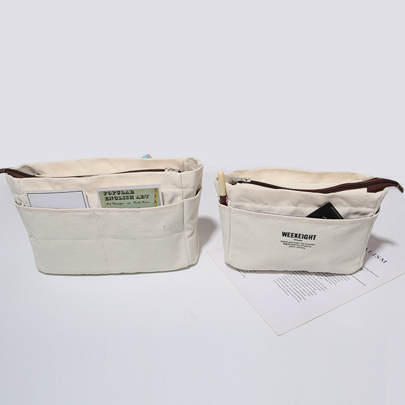 Platnena tote torba sa zatvaračem i unutarnjim džepom na zip, donjom podlogom, unutarnjim pretincima, mekanom ručkom i poliester podstavom.