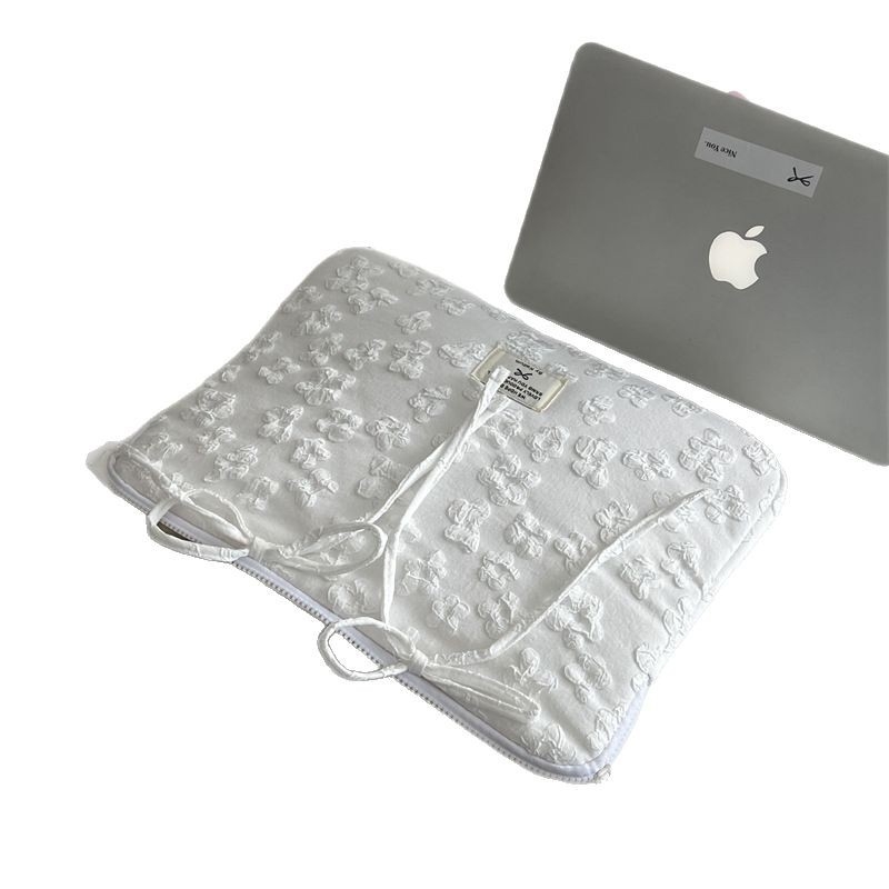 Tahvelarvuti kott lillemotiiviga ja nööriga lipsuga; polüesterist väli ja vooder; kevad 2025, naistele