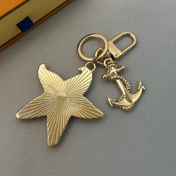 Donkey Brand breloc pentru chei, cu motiv stea de mare, din oțel inoxidabil, stil desen animat, pentru husă de telefon și geantă