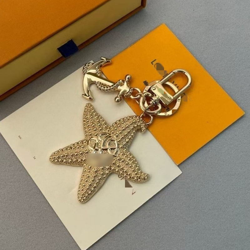 Donkey Brand breloc pentru chei, cu motiv stea de mare, din oțel inoxidabil, stil desen animat, pentru husă de telefon și geantă