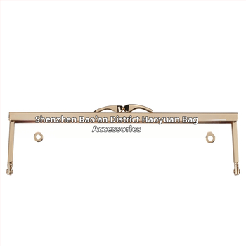 DIY pénztárca keret hardver: fishtail fej és kutya fej profilokkal; lyukak kézzel préselve és csavarokkal (Vas; 2023 tavasz; Táska kiegészítők)