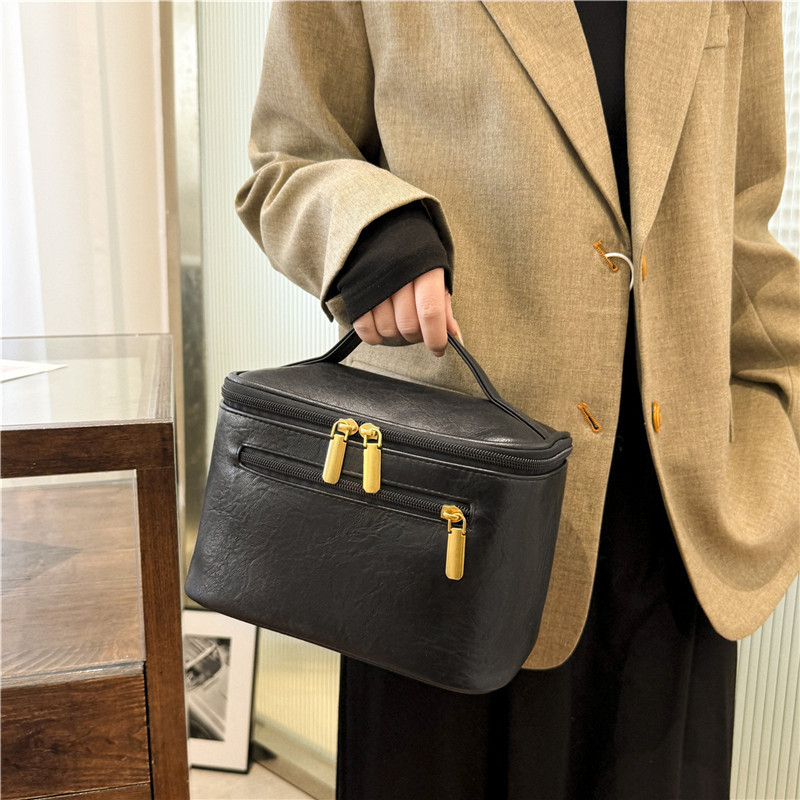 Korea stiili reisi kosmeetikakott, veekindel PU materjal, kaasaskantav suur maht, tõmblukuga avamine ja ühe suuna rattaga