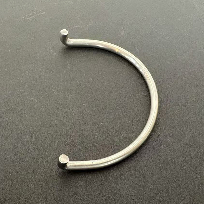 Nerūsējošā tērauda rokas turētājs bagāžai – arkveida tilta dizains, daudzfunkcionāls vilkšanas gredzens