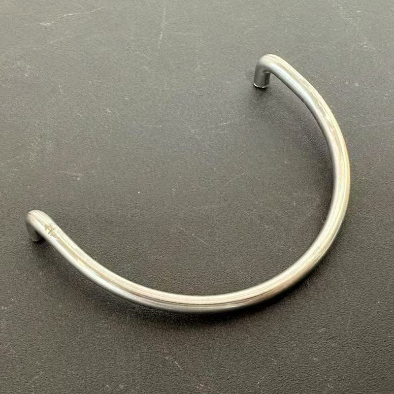 Nerūsējošā tērauda rokas turētājs bagāžai – arkveida tilta dizains, daudzfunkcionāls vilkšanas gredzens