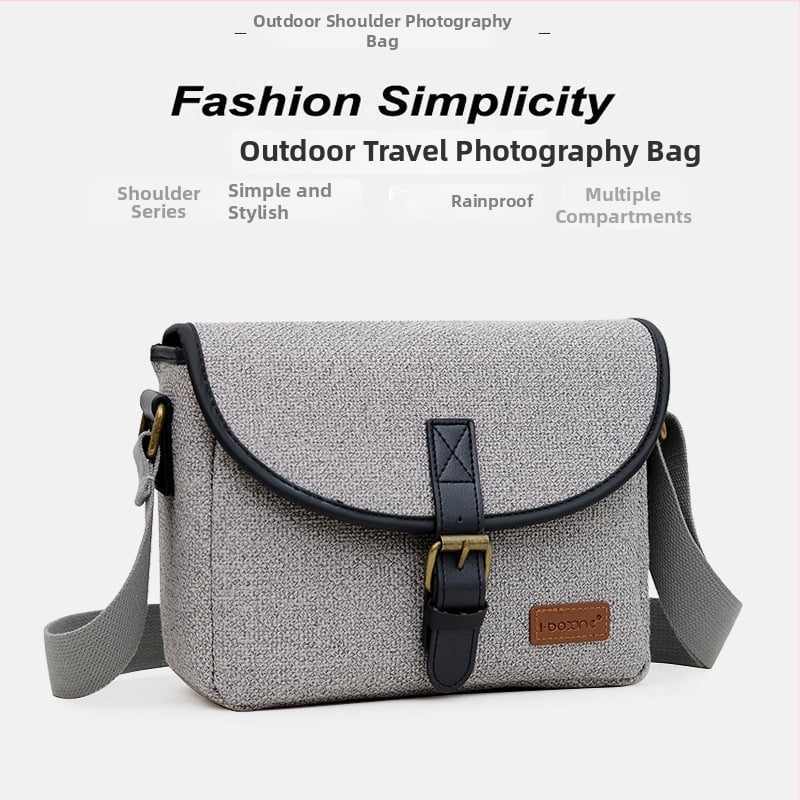 Nylon vállkamera táska DSLR/Mirrorlesshez, Modell D32, 1 kamera + 2 objektív befogadás, vízlepergető, kopásálló, lopás elleni védelem, ütésálló