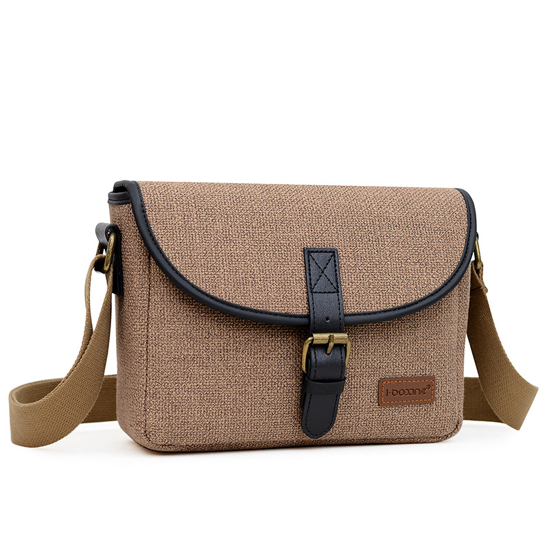 Nylon vállkamera táska DSLR/Mirrorlesshez, Modell D32, 1 kamera + 2 objektív befogadás, vízlepergető, kopásálló, lopás elleni védelem, ütésálló