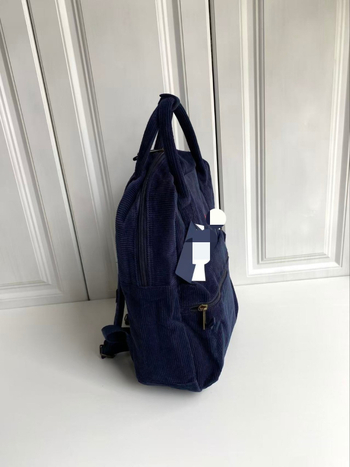 Unisex bársony hátizsák, kapacitás 20L alatt, kompatibil 9 hüvelykes laptophoz, hullámpontos mintázat.