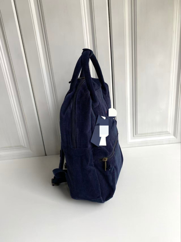 Unisex bársony hátizsák, kapacitás 20L alatt, kompatibil 9 hüvelykes laptophoz, hullámpontos mintázat.