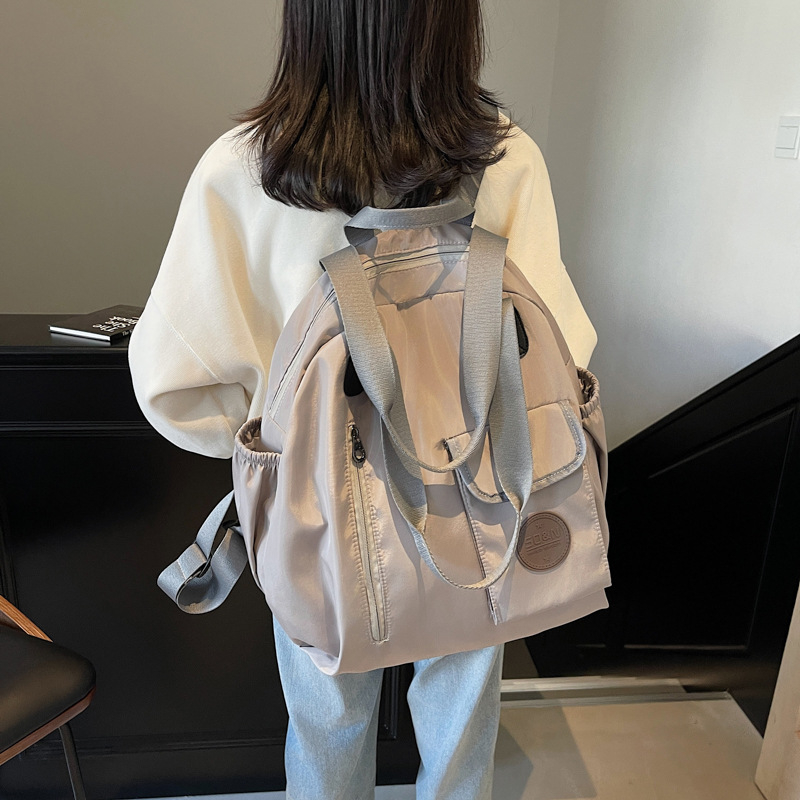 Rucsac multifuncțional (capacitate 20–35 L, încapere pentru laptop de 15 inch, material textil, căptușeală din poliester, curea de umăr curbată)