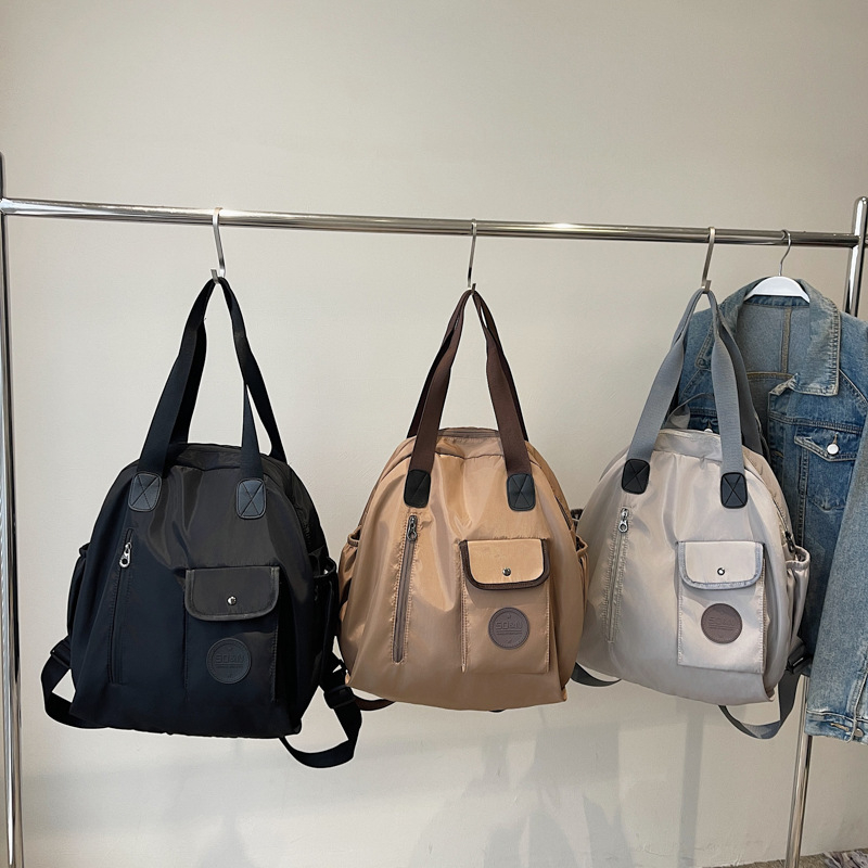 Rucsac multifuncțional (capacitate 20–35 L, încapere pentru laptop de 15 inch, material textil, căptușeală din poliester, curea de umăr curbată)