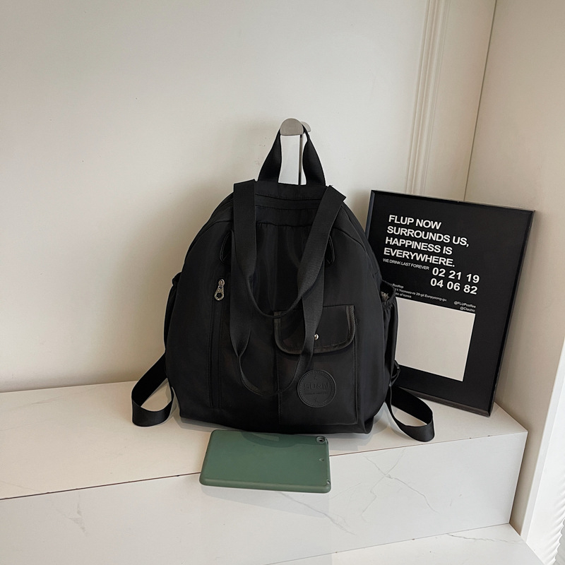 Rucsac multifuncțional (capacitate 20–35 L, încapere pentru laptop de 15 inch, material textil, căptușeală din poliester, curea de umăr curbată)