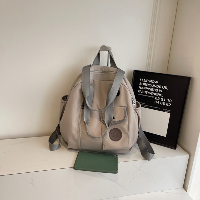 Rucsac multifuncțional (capacitate 20–35 L, încapere pentru laptop de 15 inch, material textil, căptușeală din poliester, curea de umăr curbată)