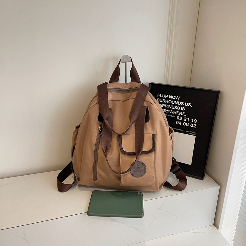 Rucsac multifuncțional (capacitate 20–35 L, încapere pentru laptop de 15 inch, material textil, căptușeală din poliester, curea de umăr curbată)