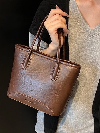 Bucket torba od PU materijala, cilindrični oblik, zatvarač, unutarnja podstava od najlona, gradski minimalistički stil
