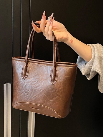 Bucket torba od PU materijala, cilindrični oblik, zatvarač, unutarnja podstava od najlona, gradski minimalistički stil