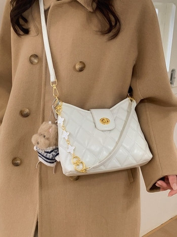PU kožna crossbody torba s prešivanim uzorkom, zatvaračem i džepom za telefon