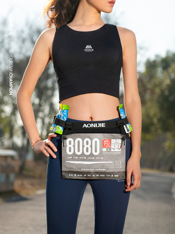 Aonijie maratonski pojas za broj – elastičan, reflektirajući, vodootporan, lagan, džep za gel, odjeljak suho/mokro