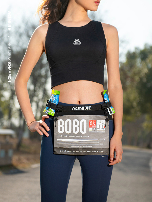 Aonijie maratonski pojas za broj – elastičan, reflektirajući, vodootporan, lagan, džep za gel, odjeljak suho/mokro