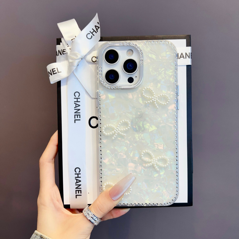 TPU védőtok iPhone 16 Pro-hoz 3D masnival és kagyló mintázattal