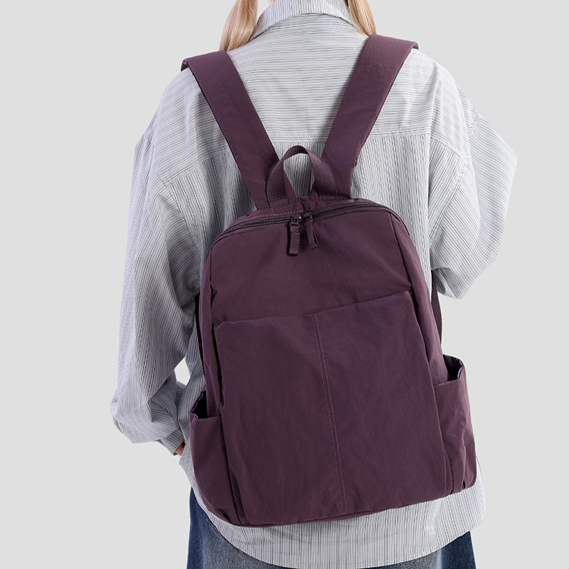 Unisex nylon ruksak, 20–35 L, kompatibilan s 12-inčnim prijenosnikom, zakrivljene naramenice, gradski minimalistički stil